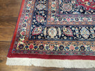 1950s Persian Mashad Rug 8' 3" x 11' 7", Room Sized Persian Carpet, Semi Antique, Medallion with Floral Allover Pattern, Red and Navy Blue Signature Master Weaver - Jewel Rugs