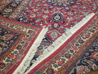 1950s Persian Mashad Rug 8' 3" x 11' 7", Room Sized Persian Carpet, Semi Antique, Medallion with Floral Allover Pattern, Red and Navy Blue Signature Master Weaver - Jewel Rugs